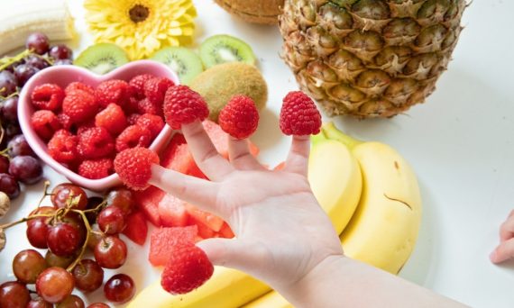 Fruit Raspberries Kiwi Watermelon Flowers Ginger Bananas Pineapple Flatlay raspberry fingers kids hands healthy snack